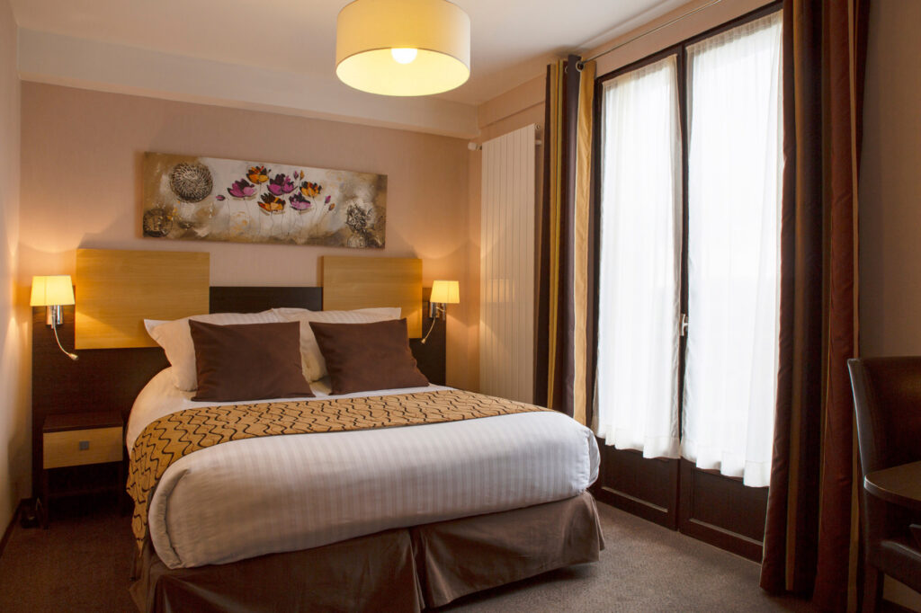 Chambre de l’Auberge de la Petite Ferme pour groupe à Besse-et-Saint-Anastaise