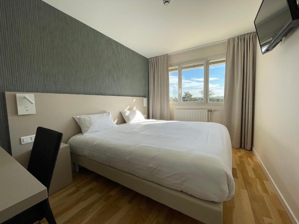 Chambre de l’Hôtel Valpré pour groupe à Écully près de Lyon